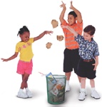 Children throwing garbage in the garbage can